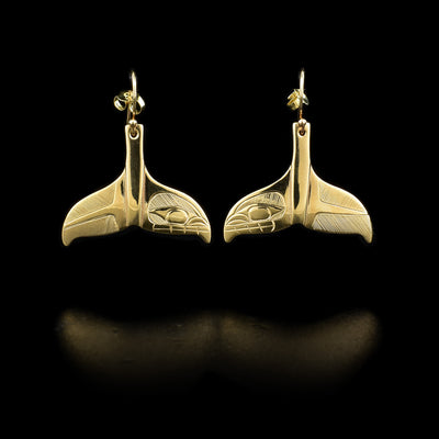Orcas carved into the fins. Made of 14K yellow gold. Hand-carved by Haisla artist Hollie Bartlett.