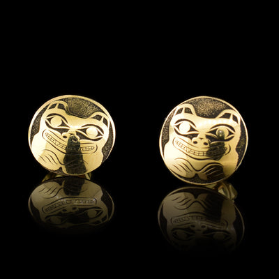 These Bear earrings are made from 14K gold and are circle shaped. There are depictions of the Bear cast into the surface of these stud earrings.