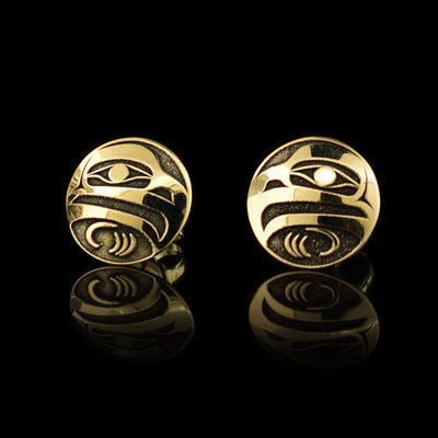 These Eagle earrings are made from 14K gold and are circle shaped. There are depictions of the Eagle cast into the surface of these stud earrings.