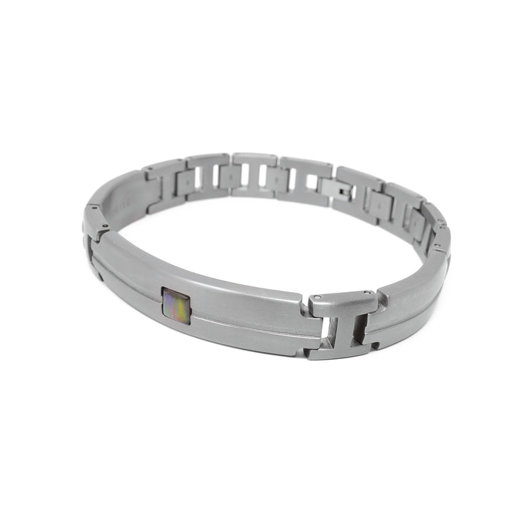 Side-view of grey titanium ammolite bracelet.