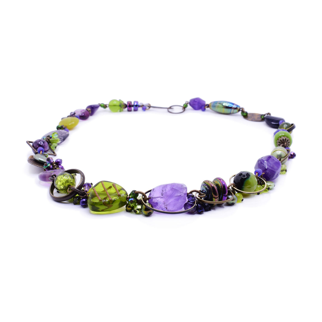 Handcrafted Mystic Gemstone Necklace, made with various gems of purple and green along with glass beads.