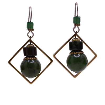 Green dangle earrings made of handworked brass, Austrian crystal and BC jade. Titanium ear hooks. By Honica.