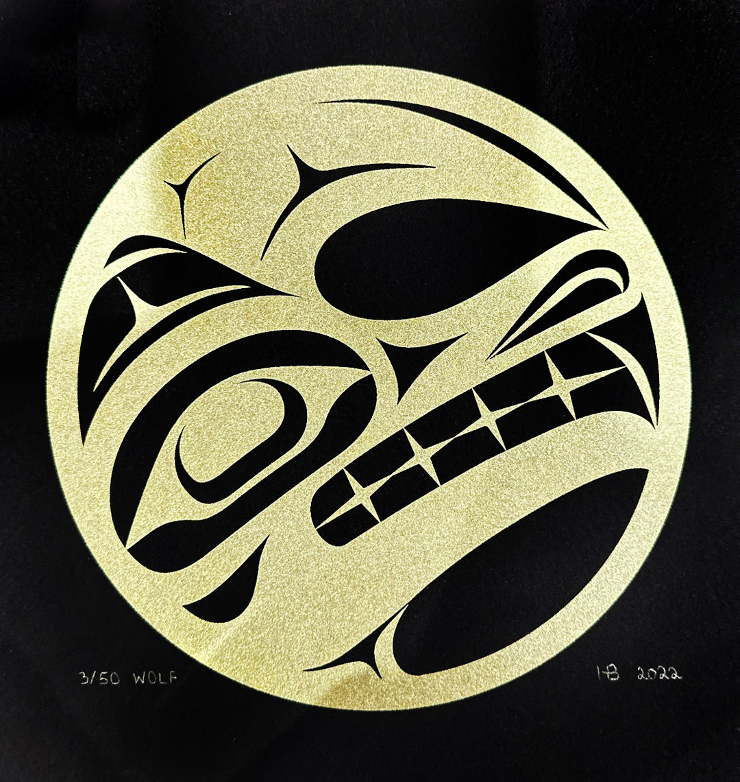 These indigenous art prints depicts the side profile of the head of the Wolf. The print is made on a black poster and the legend is depicted in sparkly gold.