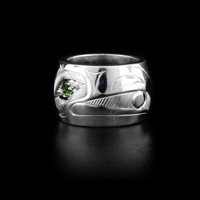 Spirit beads: This bead is made from sterling silver and has a depiction of the Raven carved into it. There is a tsavorite gemstone embedded in the eye of the Raven.