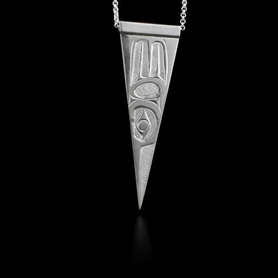 This sterling silver pendant is thin and ends in a point. it has a depiction of the Hummingbird etched into the surface.