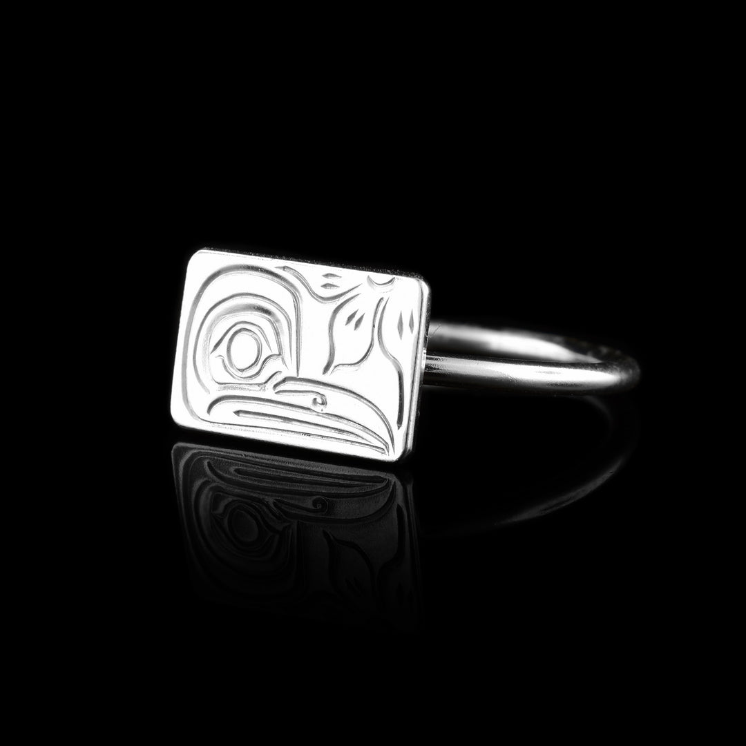 Hummingbird Crest Statement Ring, the rectangle shield is carved with the legend of the Hummingbird it is attached to a sterling silver ring band.