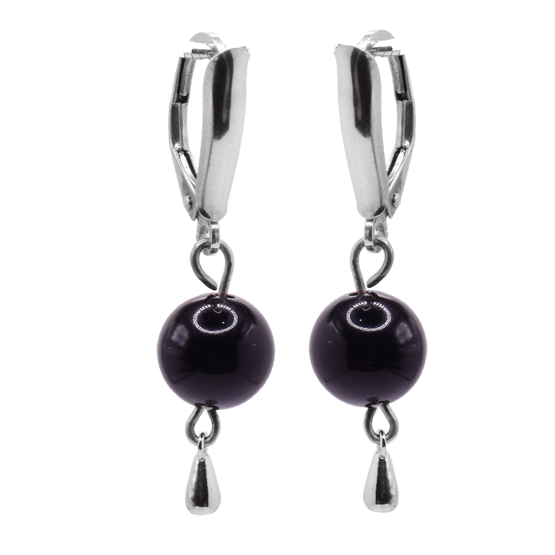 These dangle ball earrings have sterling silver, lever back hooks with sphere shaped, black onyx gems hanging from them. The stones hang from sterling silver wire and have a small, silver bead at the very bottom.
