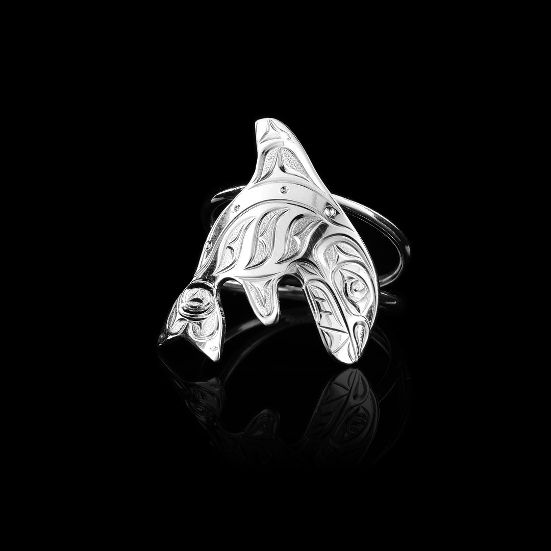 Handcrafted by artist Joe Descoteaux, this sterling silver ring features a creatively hand-carved Orca design, showcasing traditional Northwest Coast artistry. sold by Artinas Handcrafted Canadian Jewellery.