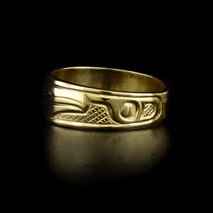 This 14K gold Raven ring has a single band and a depiction of the Raven carved into the surface of the band.