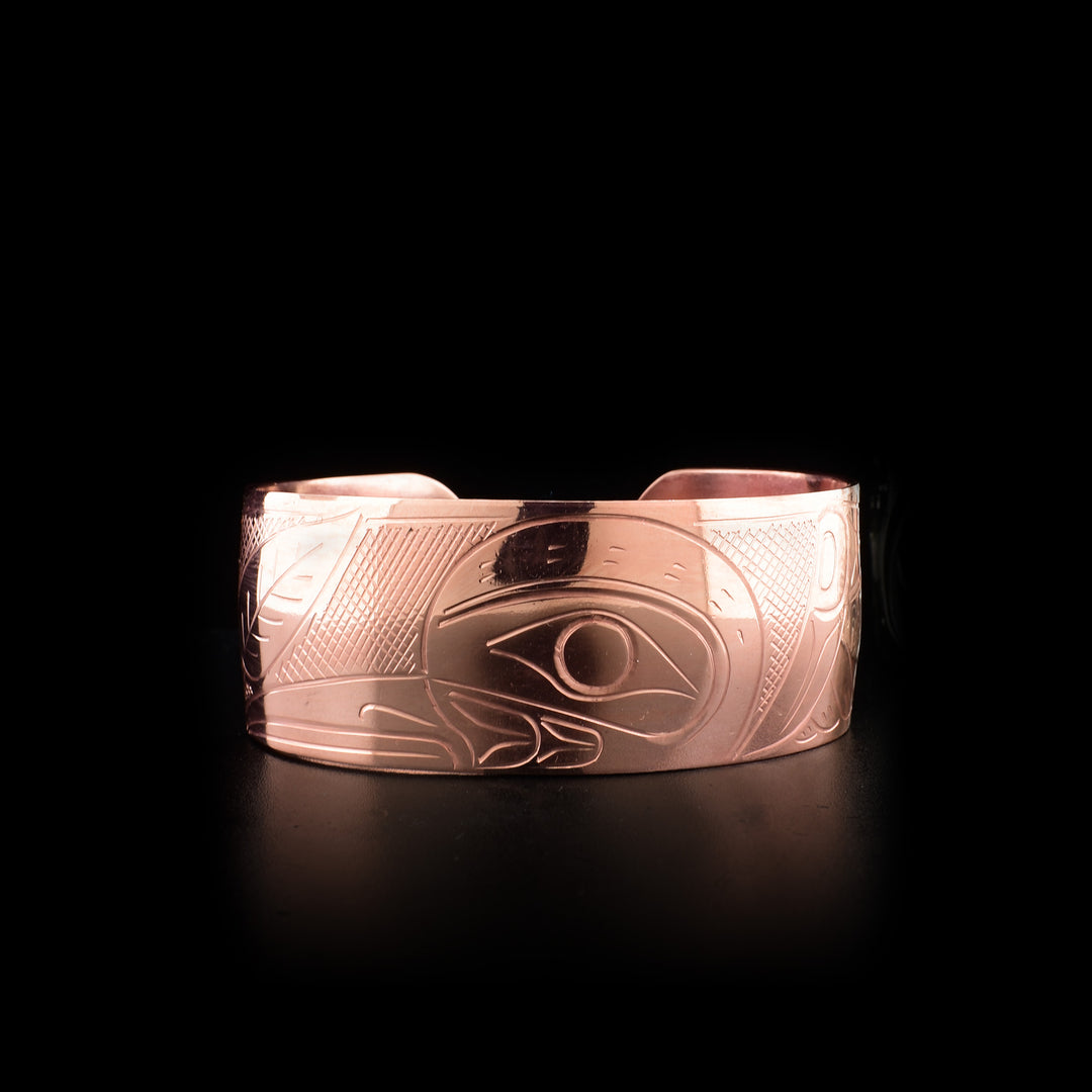 This Hummingbird bracelet is made from copper and has a thick band. There is a depiction of the Hummingbird carved into the surface of the band.