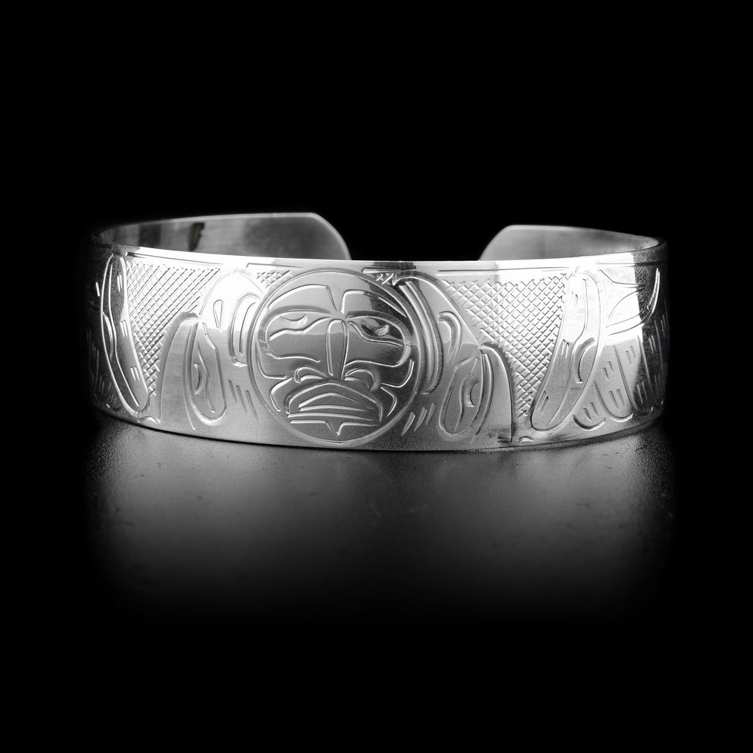 This sterling silver Moon bracelet has depictions of the Eagle, the Raven, and the Moon carved into it.
