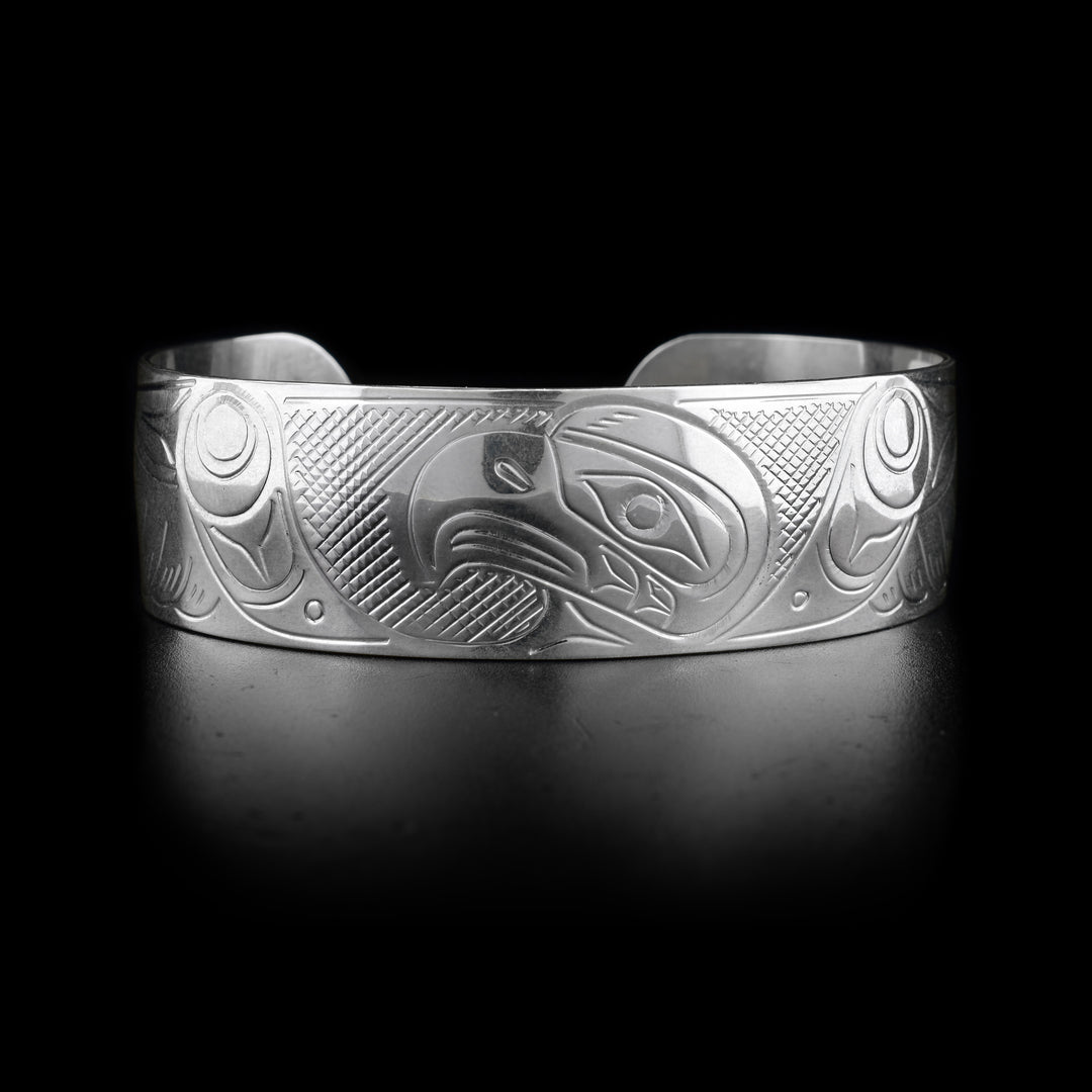 This Eagle bracelet has a wide band with a depiction of the Eagle carved into it.