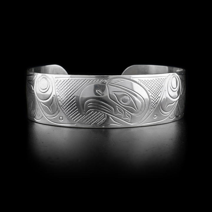 This Eagle bracelet has a wide band with a depiction of the Eagle carved into it.