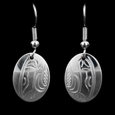 These sterling silver earrings have oval hangs with the Eagle carved into them.