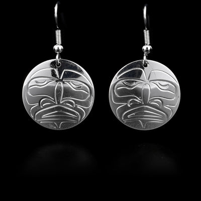 These sterling silver earrings have hooks that have Moon-shaped round hangs.