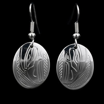 These sterling silver dangle earrings have oval hangs the Eagles etched into them.