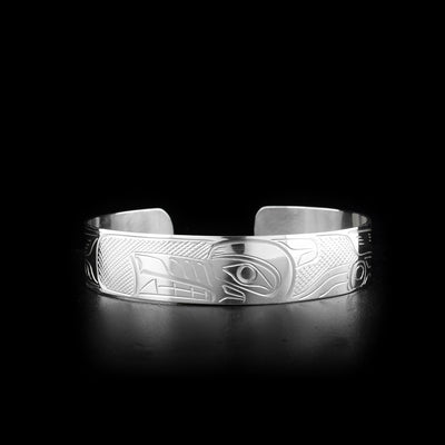 This sterling silver Wolf bracelet has a depiction of the Wolf carved into the surface of the band.