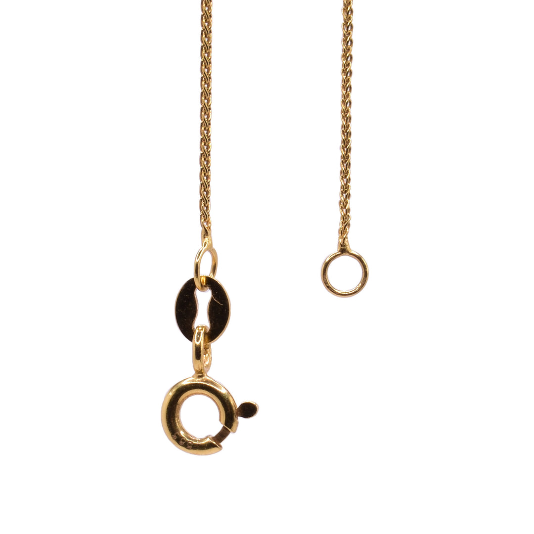 This wheat chain is made from 14K and has chain links that are twisted to resemble wheat stalks.