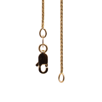 This wheat chain is made from 10K and has chain links that are twisted to resemble wheat stalks.