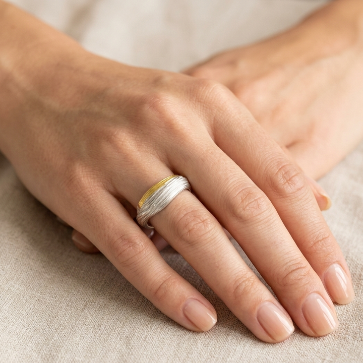 Textured silver and Keum-boo gold in a thick band.