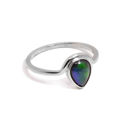 This sterling silver ammolite ring has a thin, silver band that wraps around a teardrop shaped ammolite gem at the top of the ring.