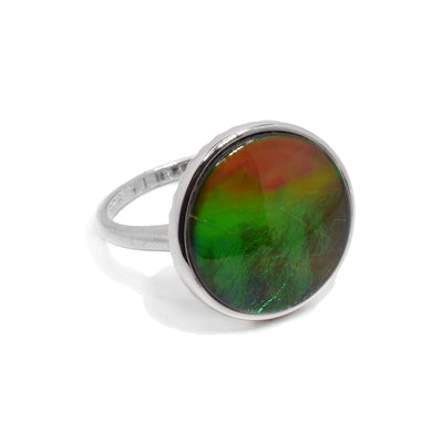 This ammolite ring is made from sterling silver and has a circle shaped ammolite gem.