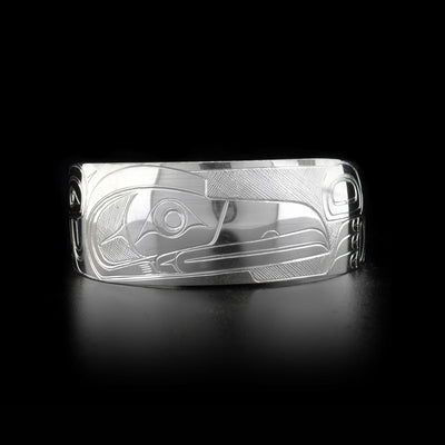 Sterling silver raven cuff bracelet. One inch wide. Meticulously hand-carved by Coast Salish artist Travis Henry.