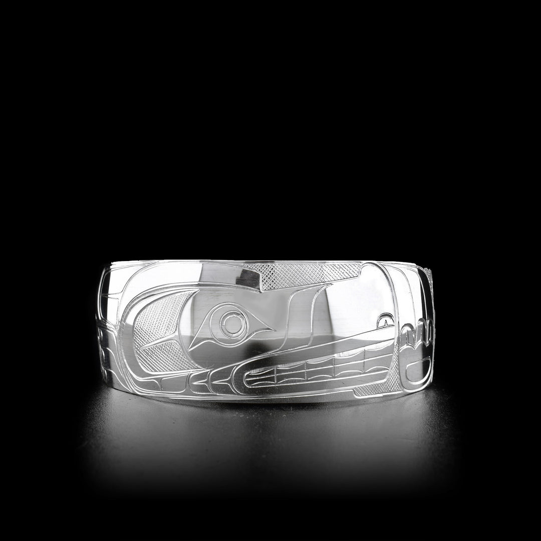Sterling silver wolf cuff bracelet. One inch wide. Meticulously hand-carved by Coast Salish artist Travis Henry.