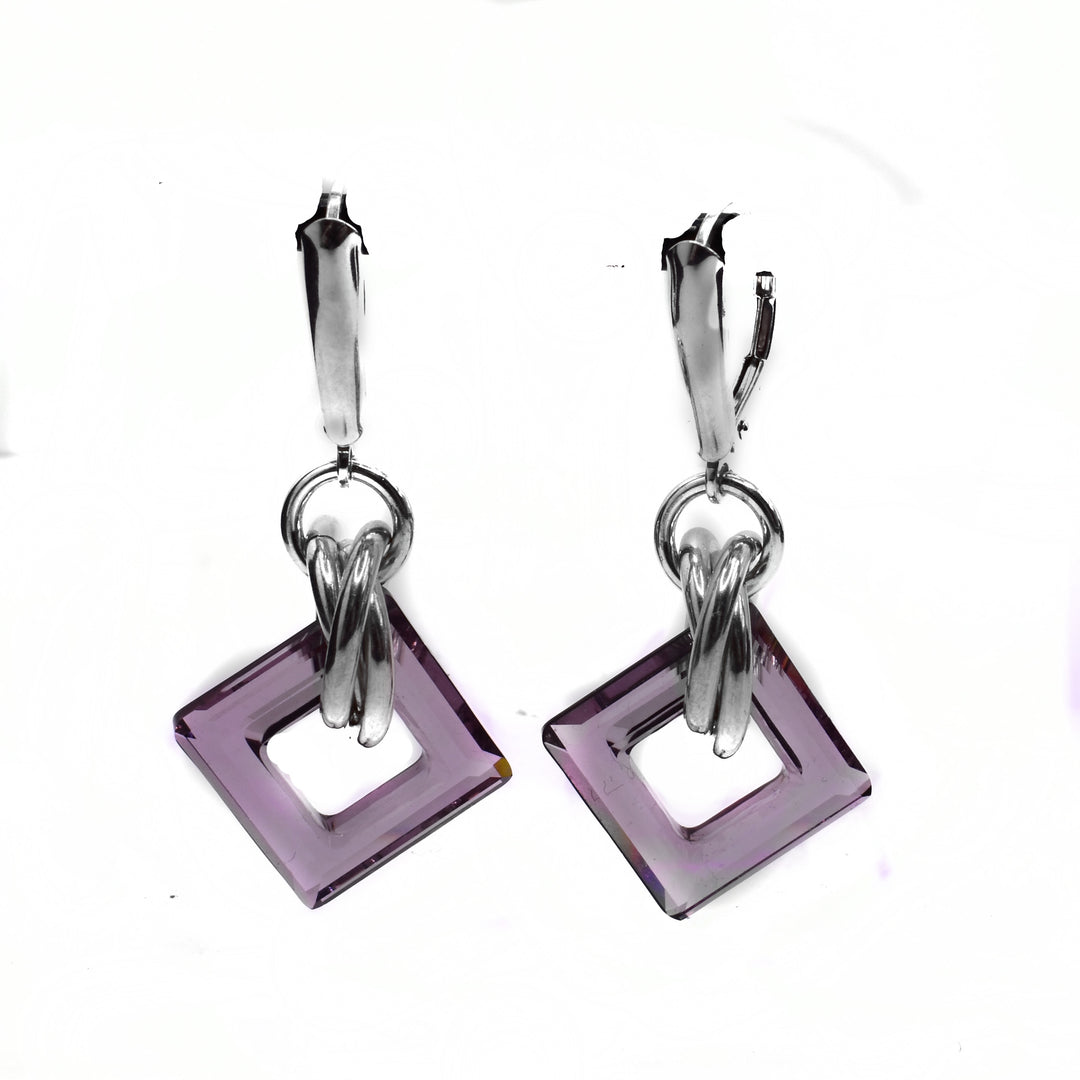 These dazzling crystal earrings have square shaped hoops made from antique pink Swarovski crystals for hangs. There crystals hangs from sterling silver links and have links wrapped around them aswell.