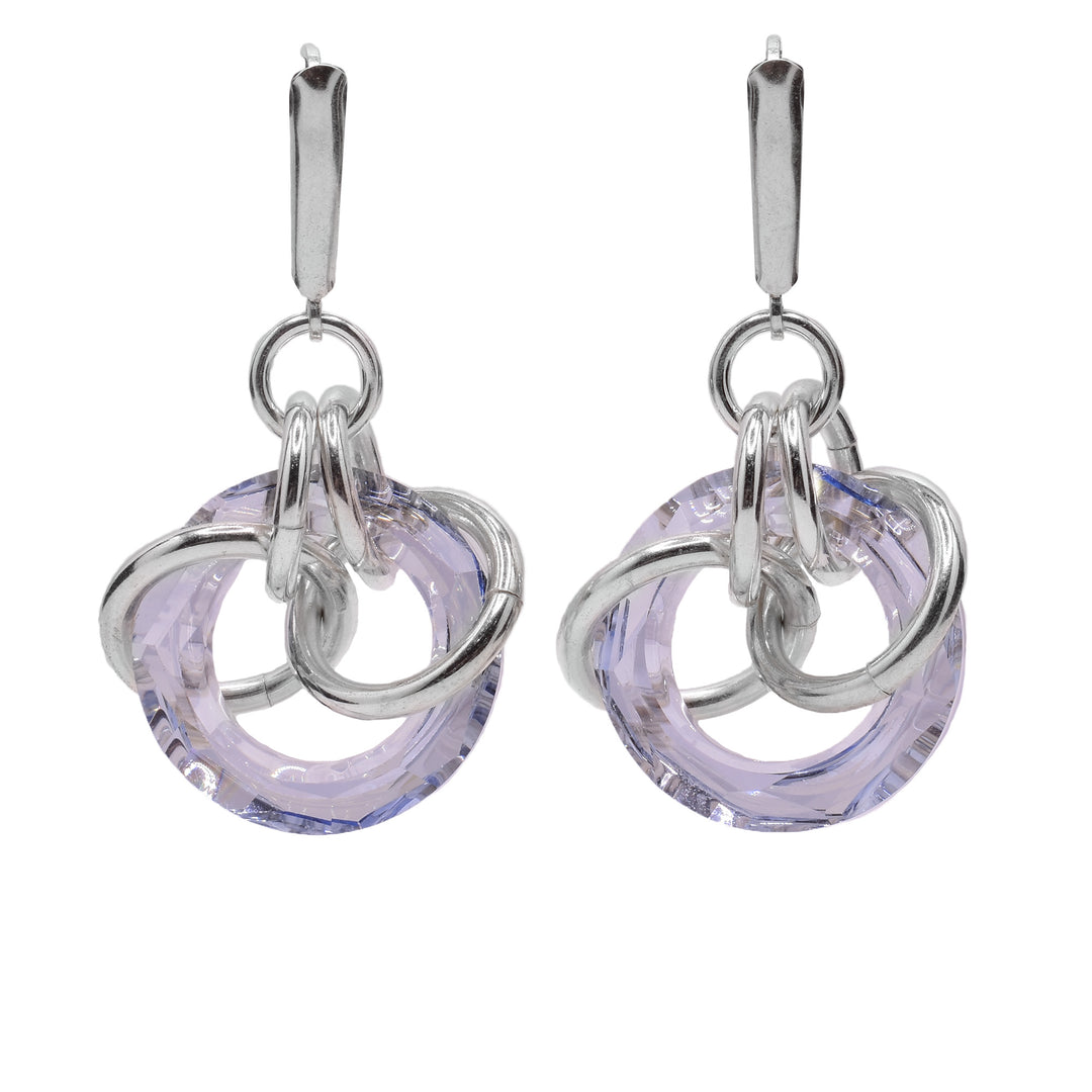 These dangle crystal earrings have disc shaped blue shadow Swarovski crystal with sterling silver hoops linked through them.
