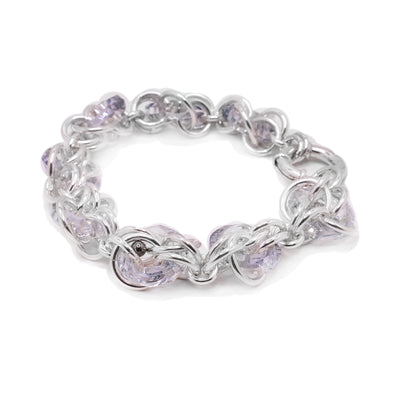 This sterling silver chain bracelet has Swarovski crystal hoops include throughout the chain.