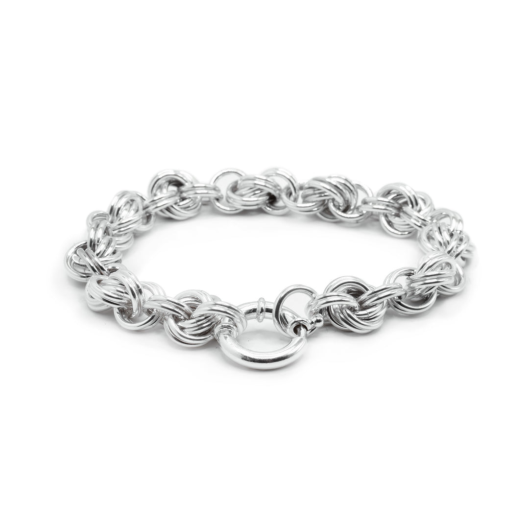 Make a statement with Lisa Ridout's sterling silver love knot chain bracelet. Expertly hand-woven links offer a classic yet bold look. Shop online.