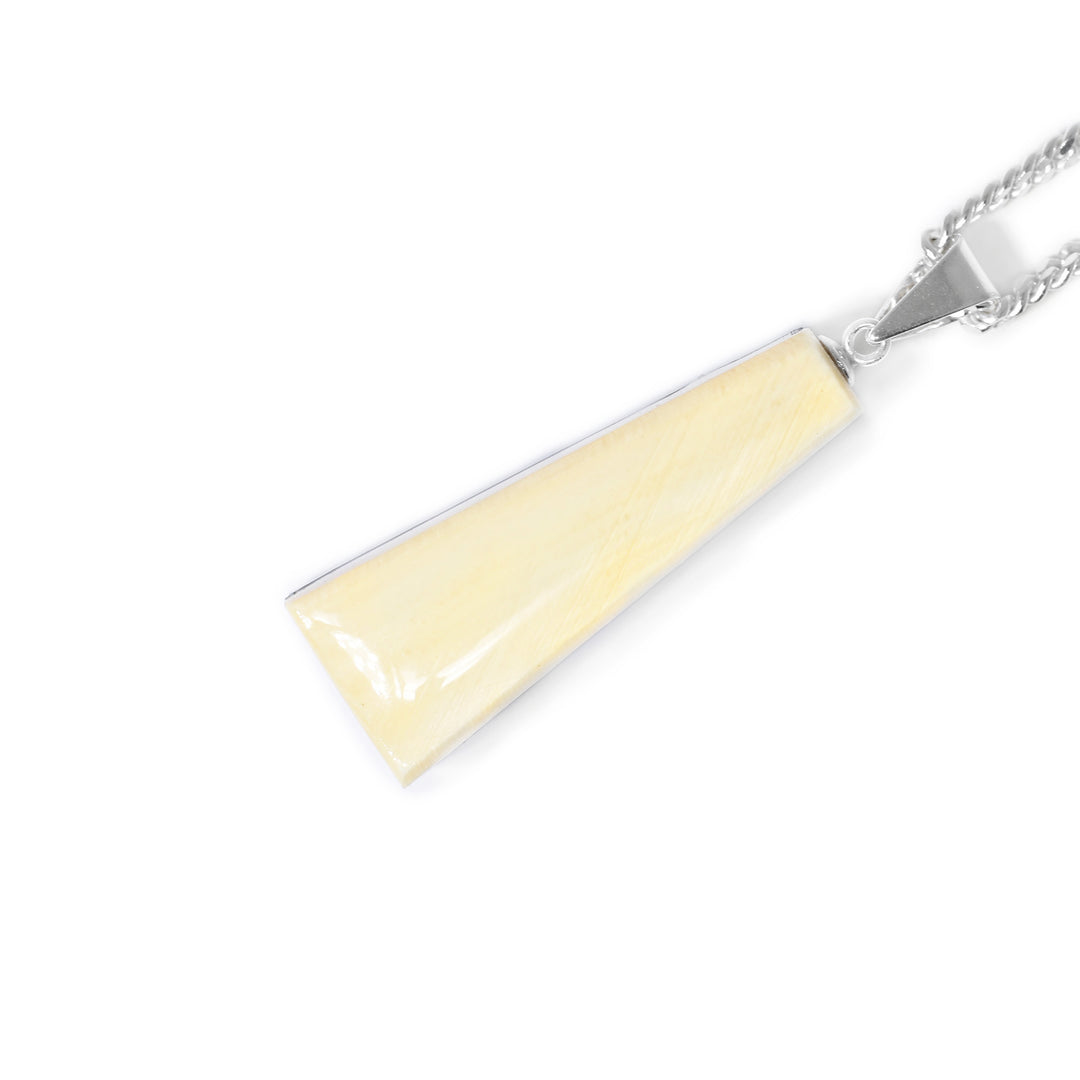 Other side of pendant made of fossilized mammoth ivory.