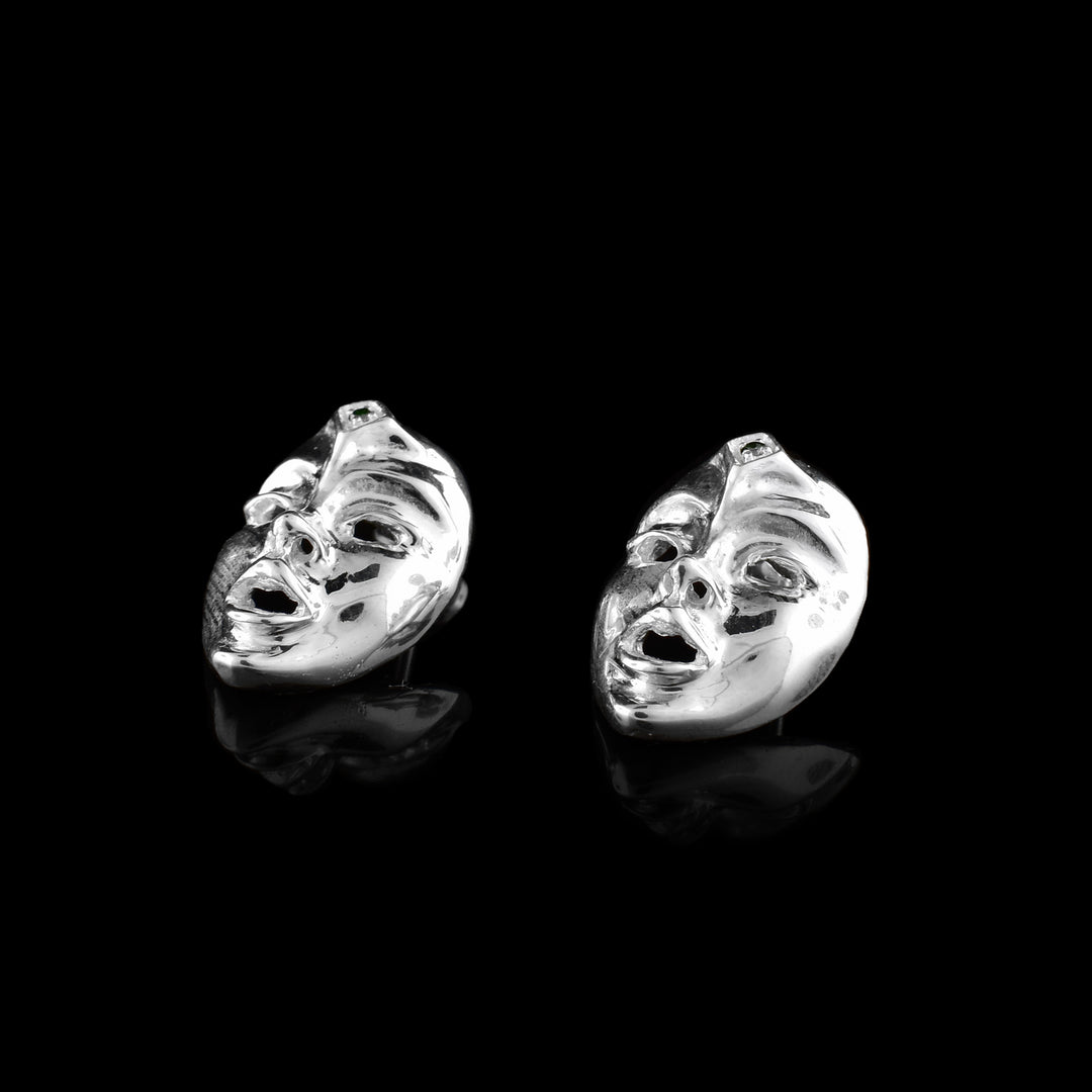 Sterling silver seer mask stud earrings with green diamonds 