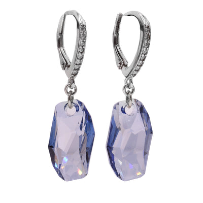 These Swarovski crystal earrings feature a dull blue elongated Swarovski crystals with sterling silver hooks that entail cubic zirconia details.