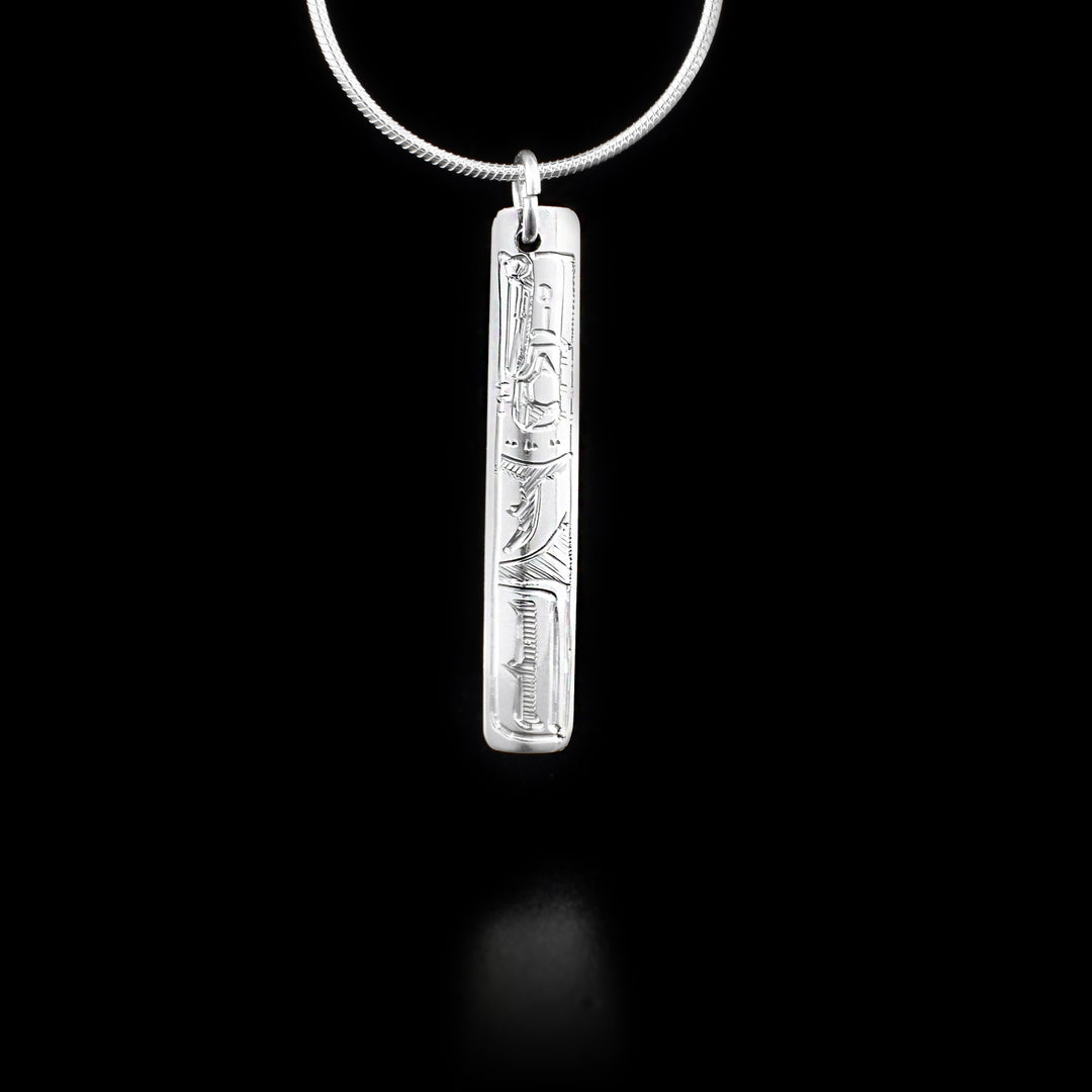 Long mini sterling silver rectangle pendant featuring raven.