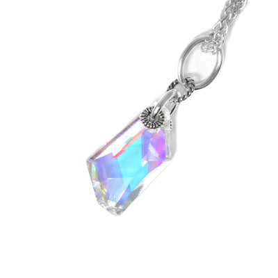 Distorted rectangle shape aurora borealis Swarovski crystal with sterling silver and oxidized silver ring adornments. Pendant measures 1.6" x 0.5".