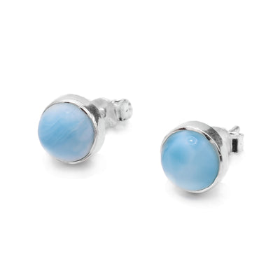 These round gemstone stud earrings are made form sterling silver and larimar gemstones. The gems are half sphere shaped and backed on silver.