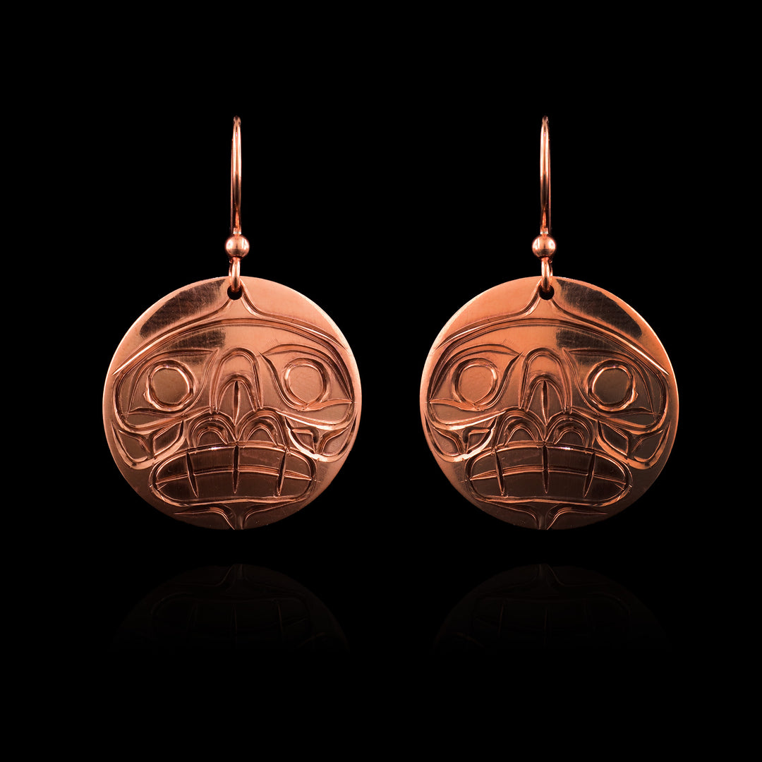 These Moon copper dangle earrings have the legend of the Moon carved on the surface of the circular copper earrings.