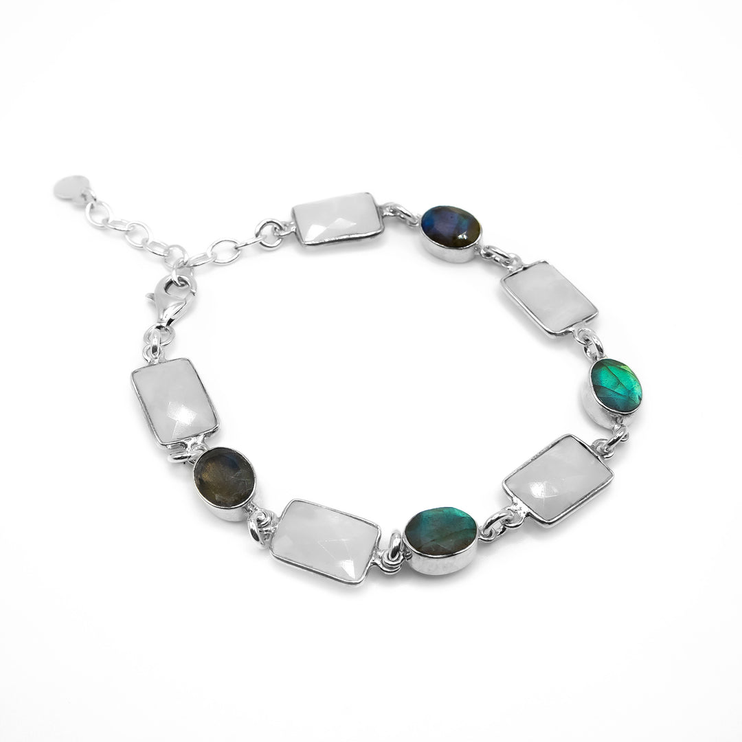 Sterling silver chain bracelet with alternating faceted beads. Larger, rectangular beads are moonstone and smaller, oval beads are labradorite.