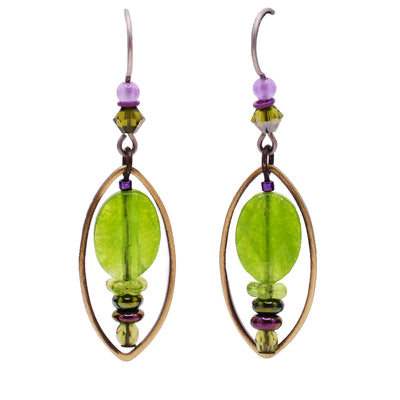 Dangle earrings made of Austrian crystal, dyed quartz, amethyst, glass and brass. Titanium hooks. By Honica.