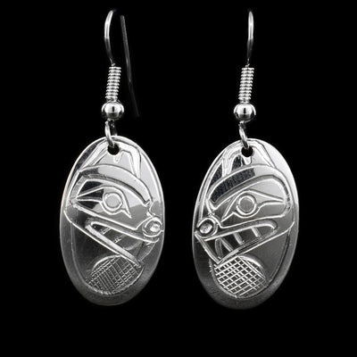 These hook, dangle earrings have sterling silver, oval hangs attached to them with the Bear carved into their surface.