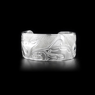 Sterling silver cuff bracelet featuring orca pod.