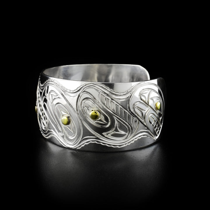 Left side of bracelet with animal heads.