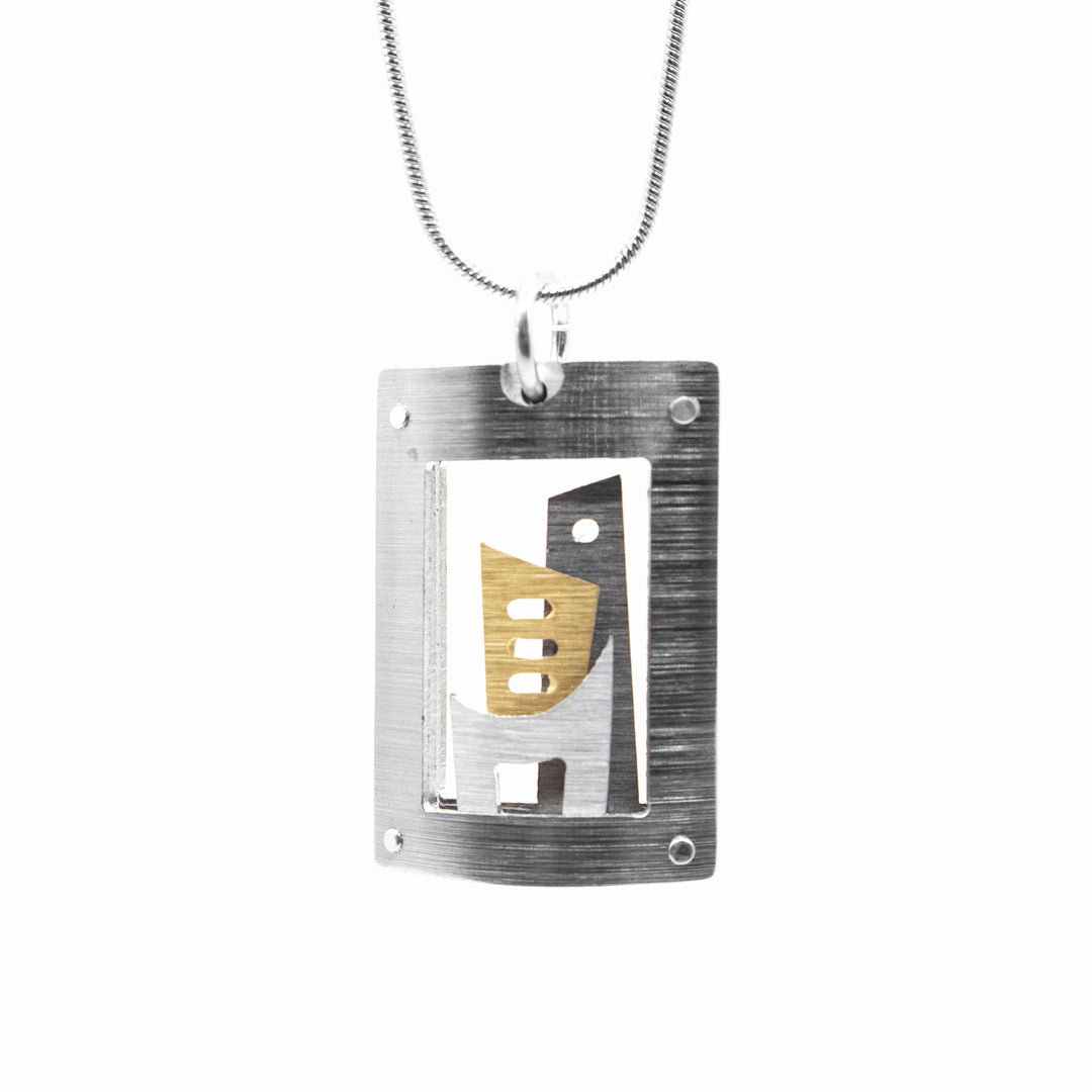 Brushed and anodized open aluminum cityscape pendant necklace by JR Franco. Minimalist design.