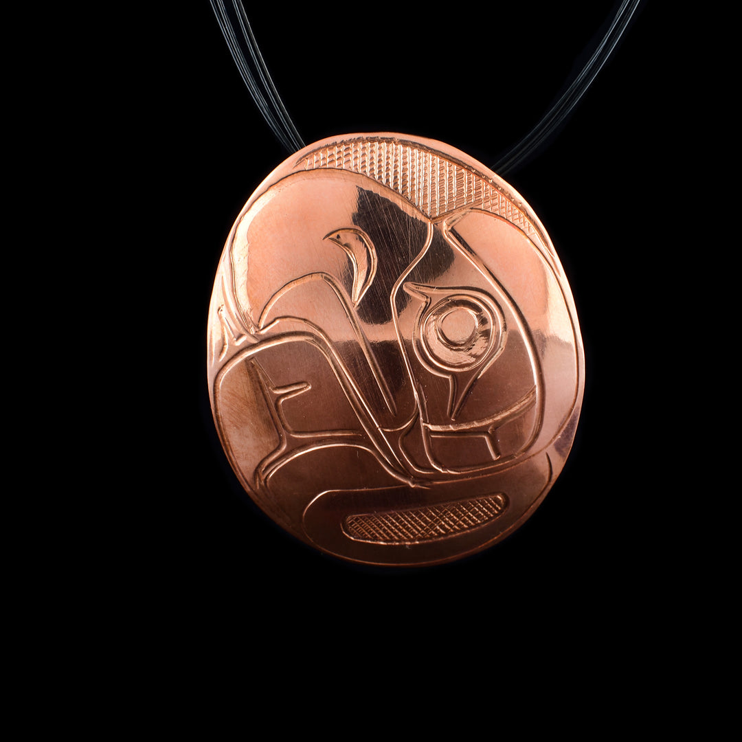 Oval Eagle Copper Pendant - The face of the Eagle is carved on the surface of this oval copper pendant looking up into the sky. 