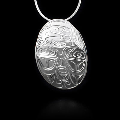 Sterling silver oval eagle with wings out pendant.