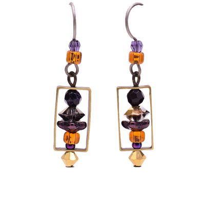 Dangle earrings made of gold-plated Austrian crystal, purple goldstone, Austrian crystal and glass. Titanium hooks. By Honica.