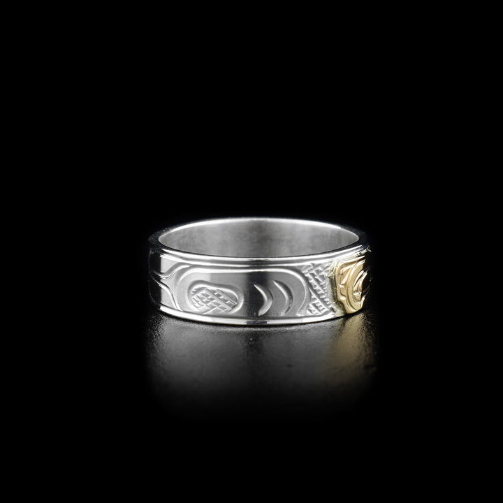 Right side of ring showing carved designs.