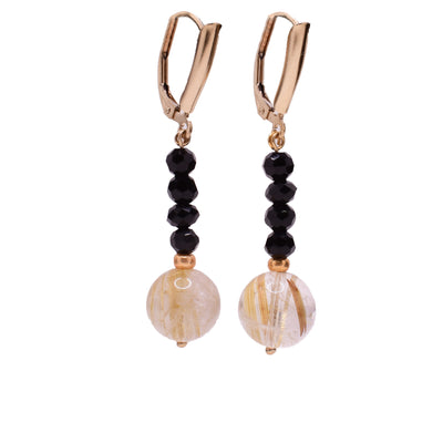 Gold-fill drop earrings with rows of black crystals leading down to round, smoky quartz beads with rutilations. Lever-back hooks.
